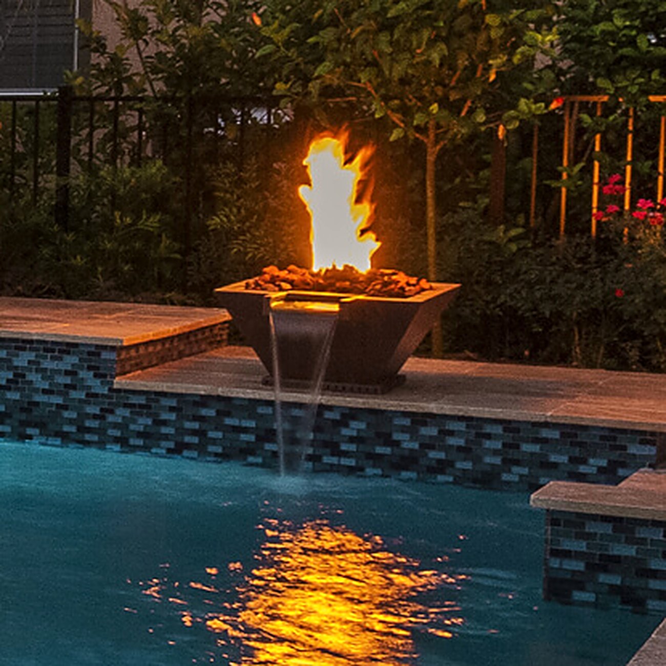 Outdoor living suite with pool, summer kitchen, and pergola in Estero, FL