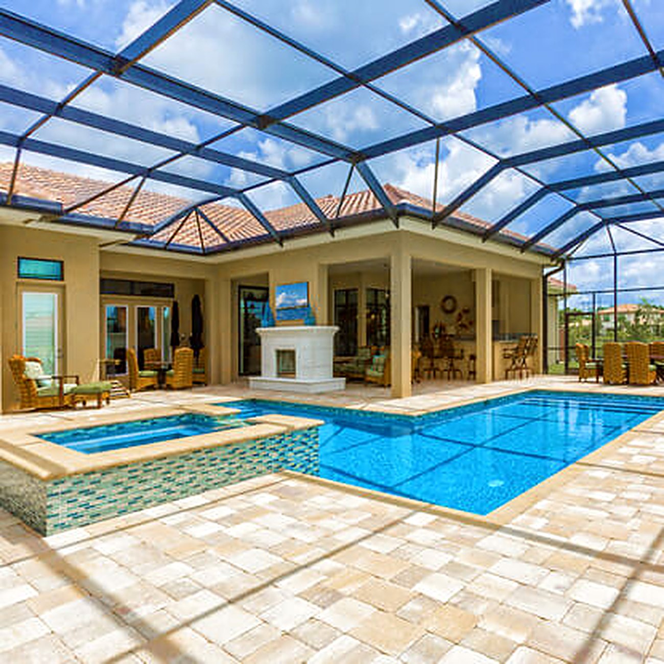 Resort pool with cascading water feature in Park Shore, Naples FL
