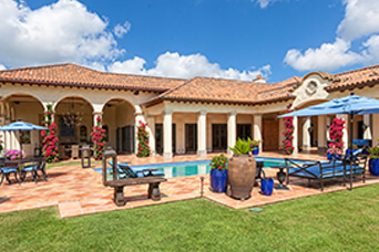 Tuscan courtyard pool with travertine deck in The Vineyards, Naples FL