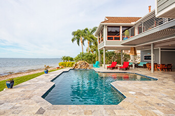 Lap pool with sun shelf in Bonita Springs, FL